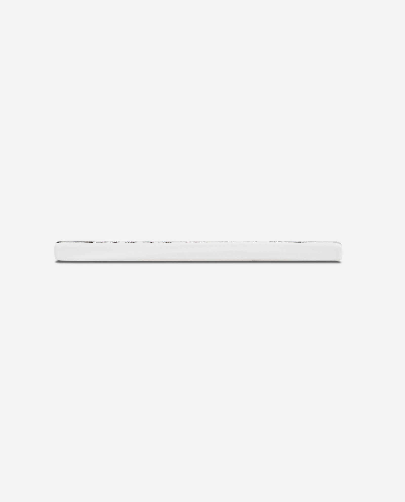 Side profile view of white ceramic Manchester Letter B tile showing slim depth and clean edges on white background by The Sculpts