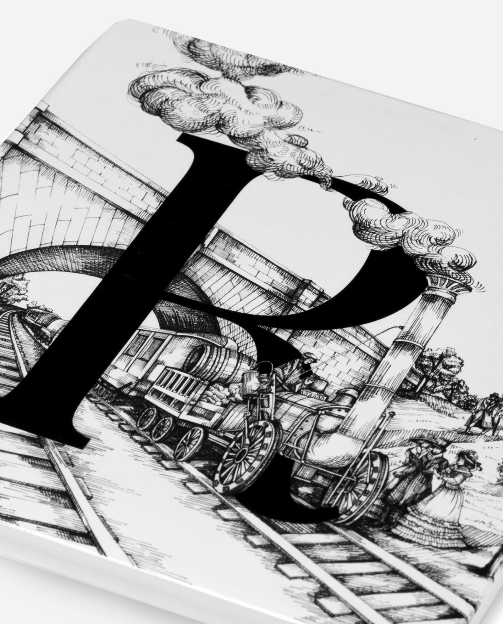 Close-up detail of Letter R Rocket tile showing intricate Victorian engraving of steam train, bridge and smoke plume