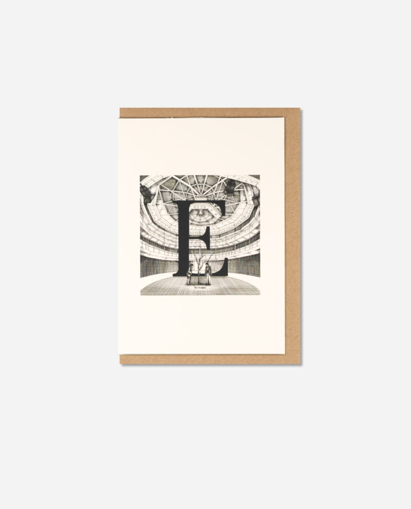 Flat lay of Exchange Theatre letter E greeting card on brown kraft envelope, cream card stock with architectural drawing