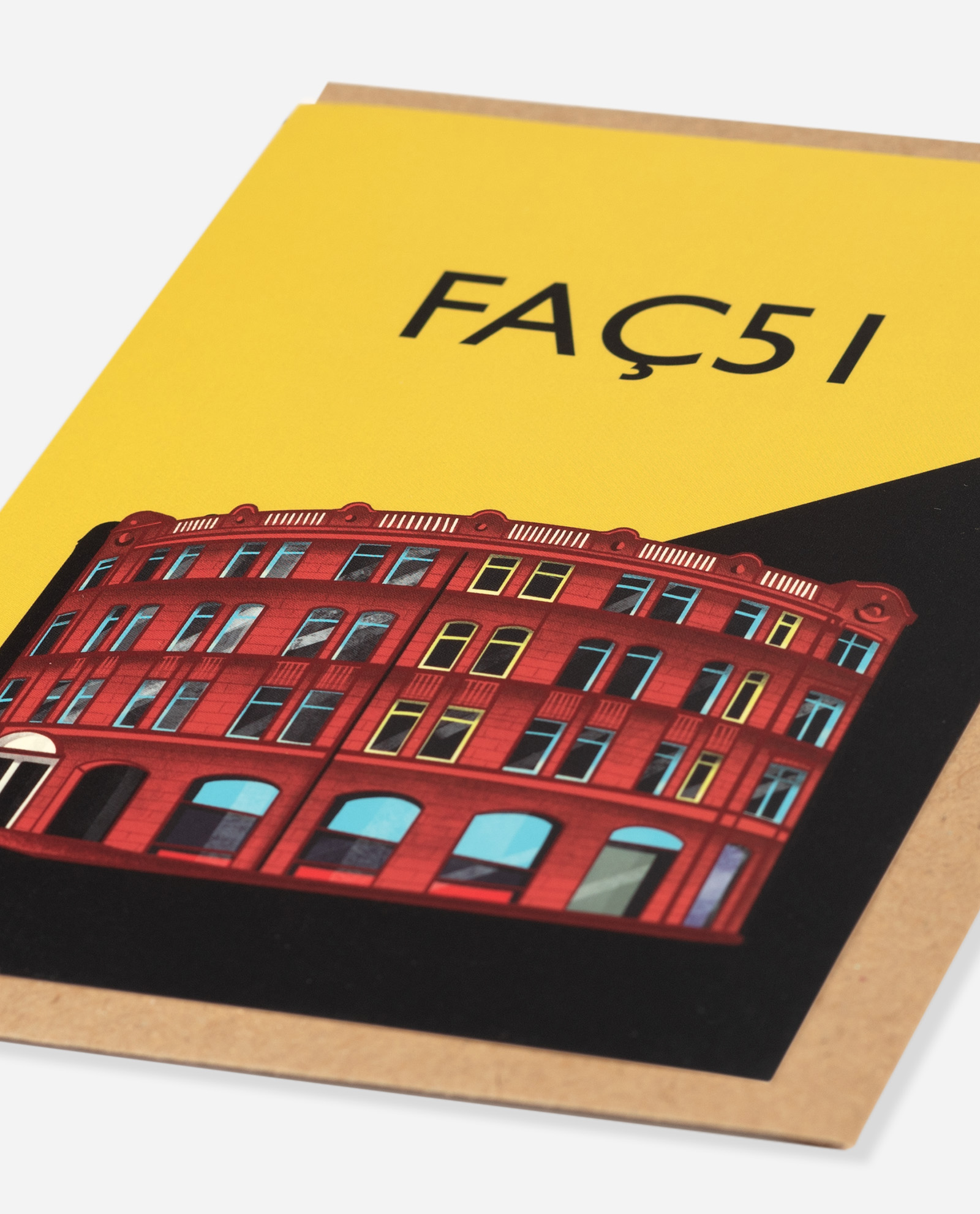 FAÇ51 Hacienda greeting card angled view showing architectural detail of red building on yellow and black design