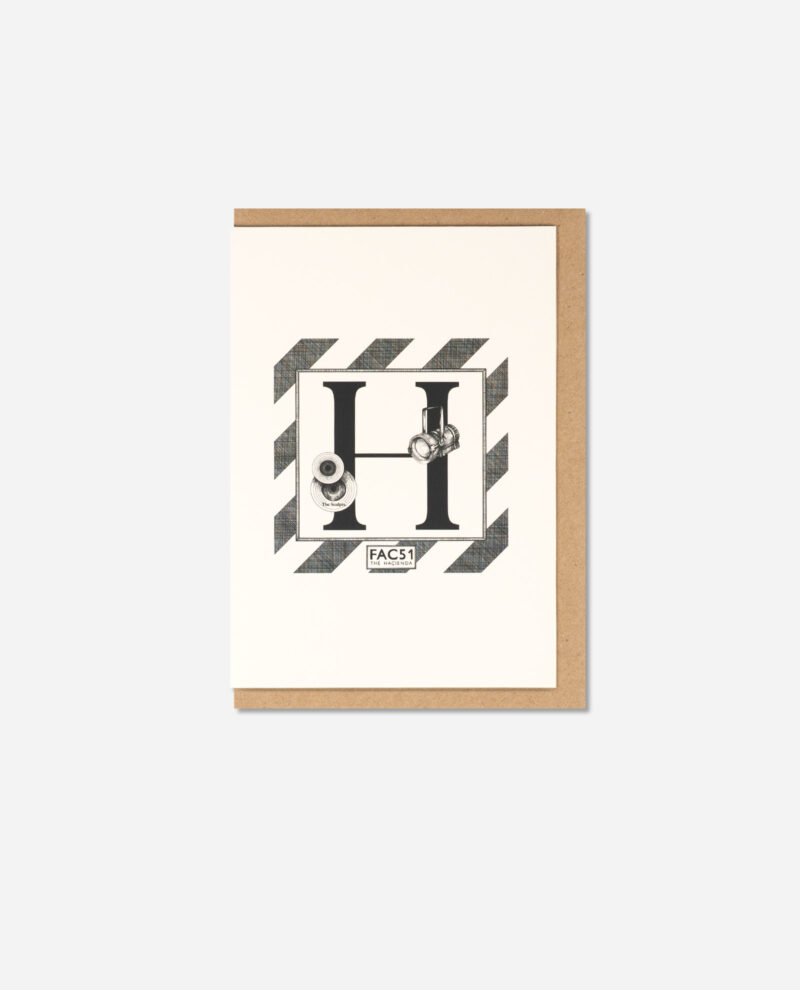 Hacienda greeting card with black H letter and grey diagonal stripes lying flat on brown kraft envelope by The Sculpts
