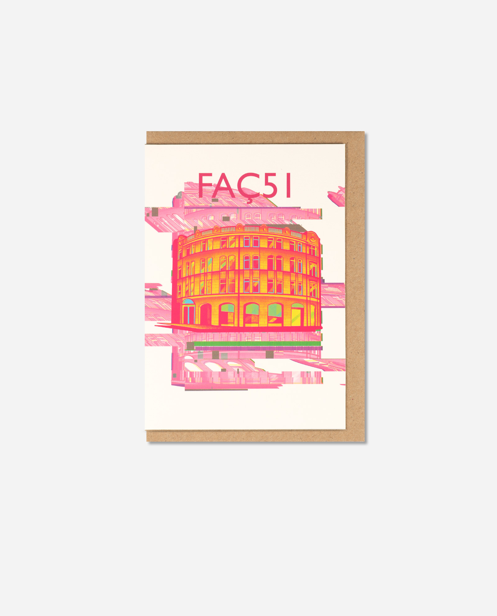 Faç51 Neon Pink greeting card showing vibrant orange Hacienda building with pink glitch effect on cream card with brown kraft envelope, overhead view