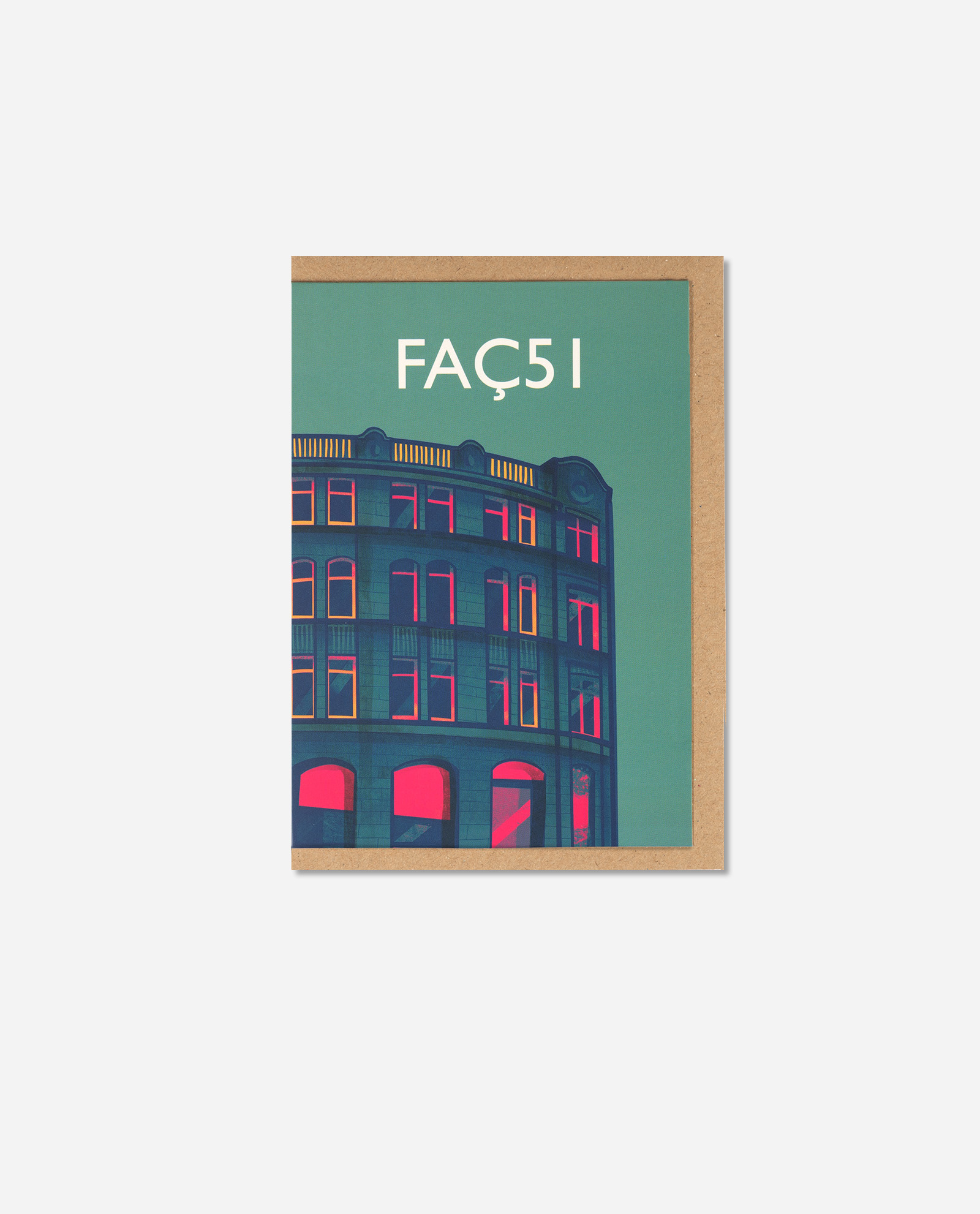 Faç51 Vivid Green greeting card by The Sculpts, top-down view on kraft envelope showing Hacienda building facade