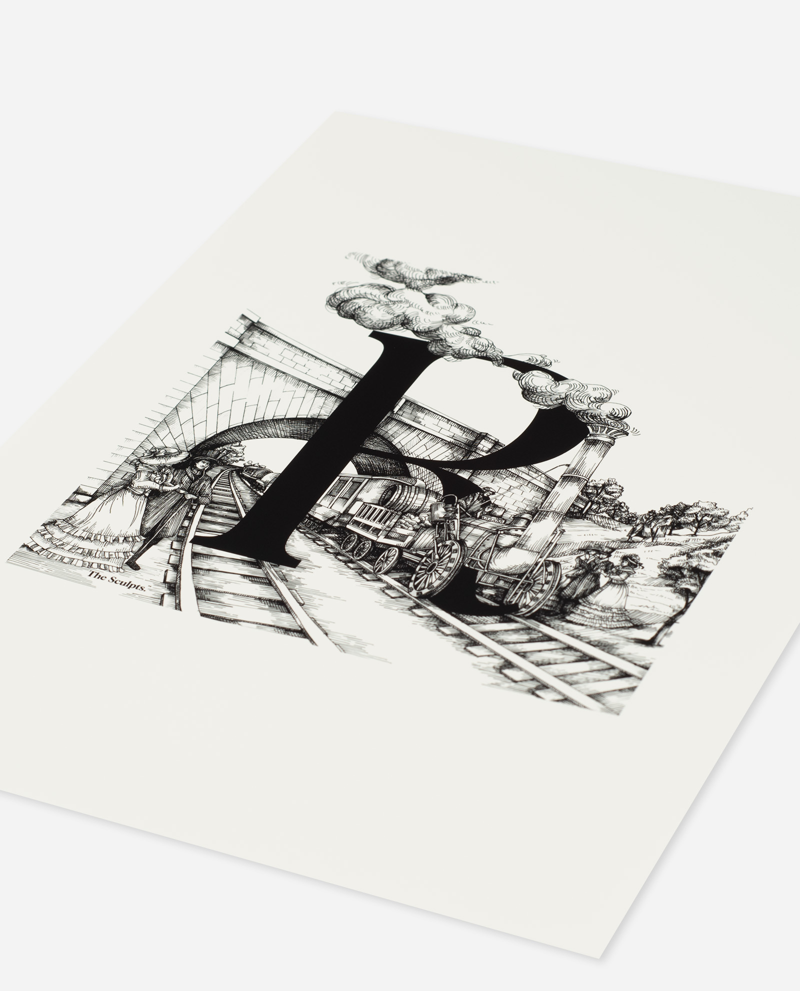 Oblique angle view of Manchester Letter R for Rocket print on white paper showing black letter with detailed Victorian railway illustration