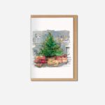 Cockapoo Christmas card showing hand-illustrated watercolour scene of cockapoo dog lying under decorated green Christmas tree with wrapped presents
