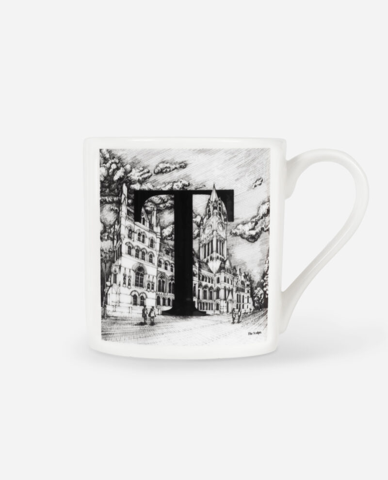Manchester Town Hall mug with black letter T and detailed Victorian building illustration on white bone china, front view