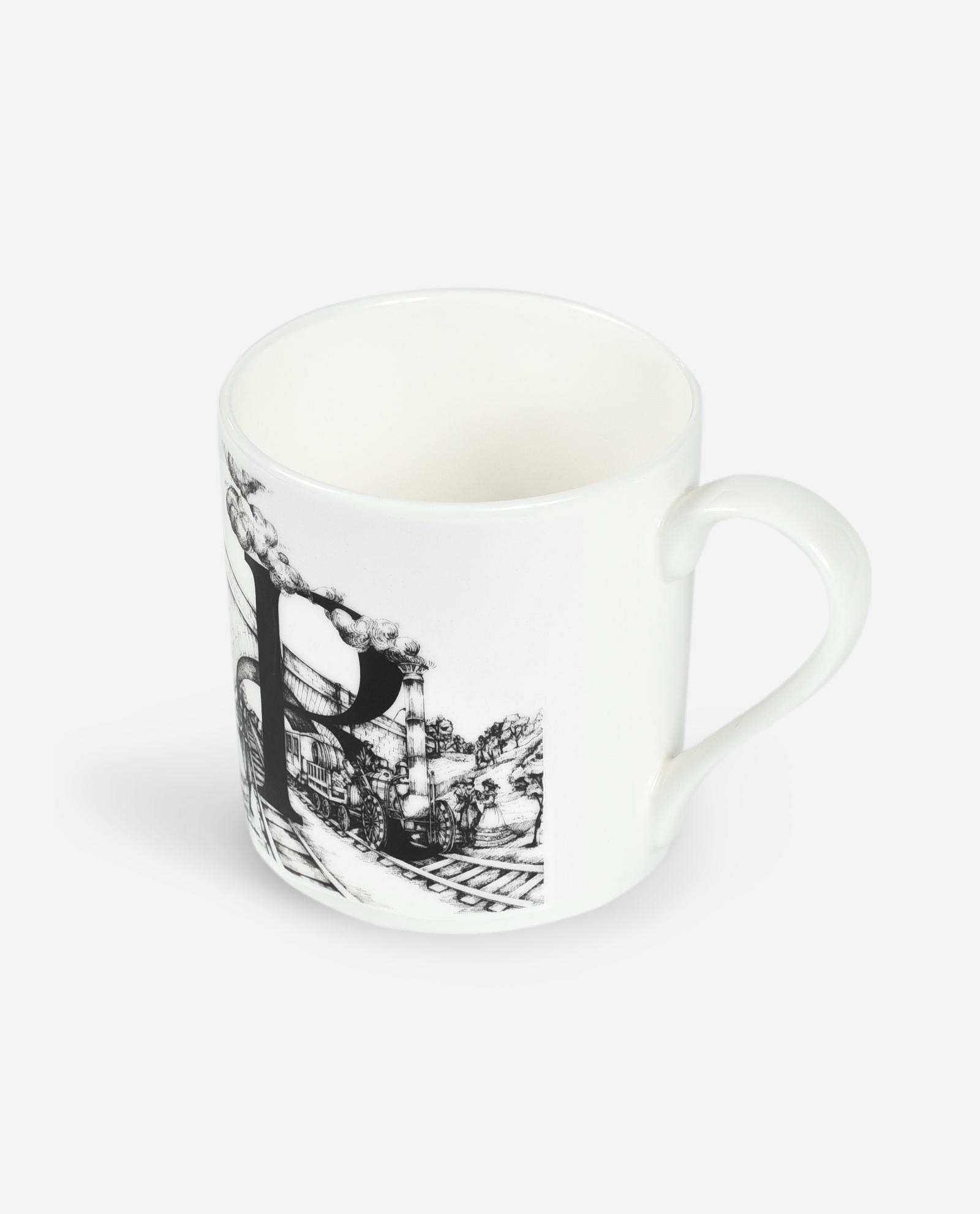 Oblique angle view of white Manchester Letter R mug showing curved handle and wraparound Stephenson's Rocket illustration
