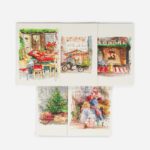 Five cockapoo Christmas greeting cards by The Sculpts arranged in two rows showing watercolour illustrations of festive Manchester scenes