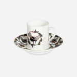 Honeycomb Bee espresso cup and saucer by The Sculpts showing white porcelain with illustrated bees and leaves in tan and olive