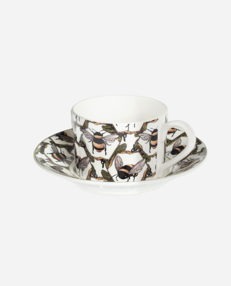 Honeycomb Bee teacup and saucer in fine bone china with illustrated bees in black, orange and olive green on white background
