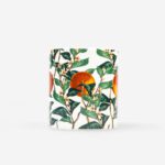 Citrus Vulgaris candle by The Sculpts showing botanical orange and green leaf pattern on white bone china vessel