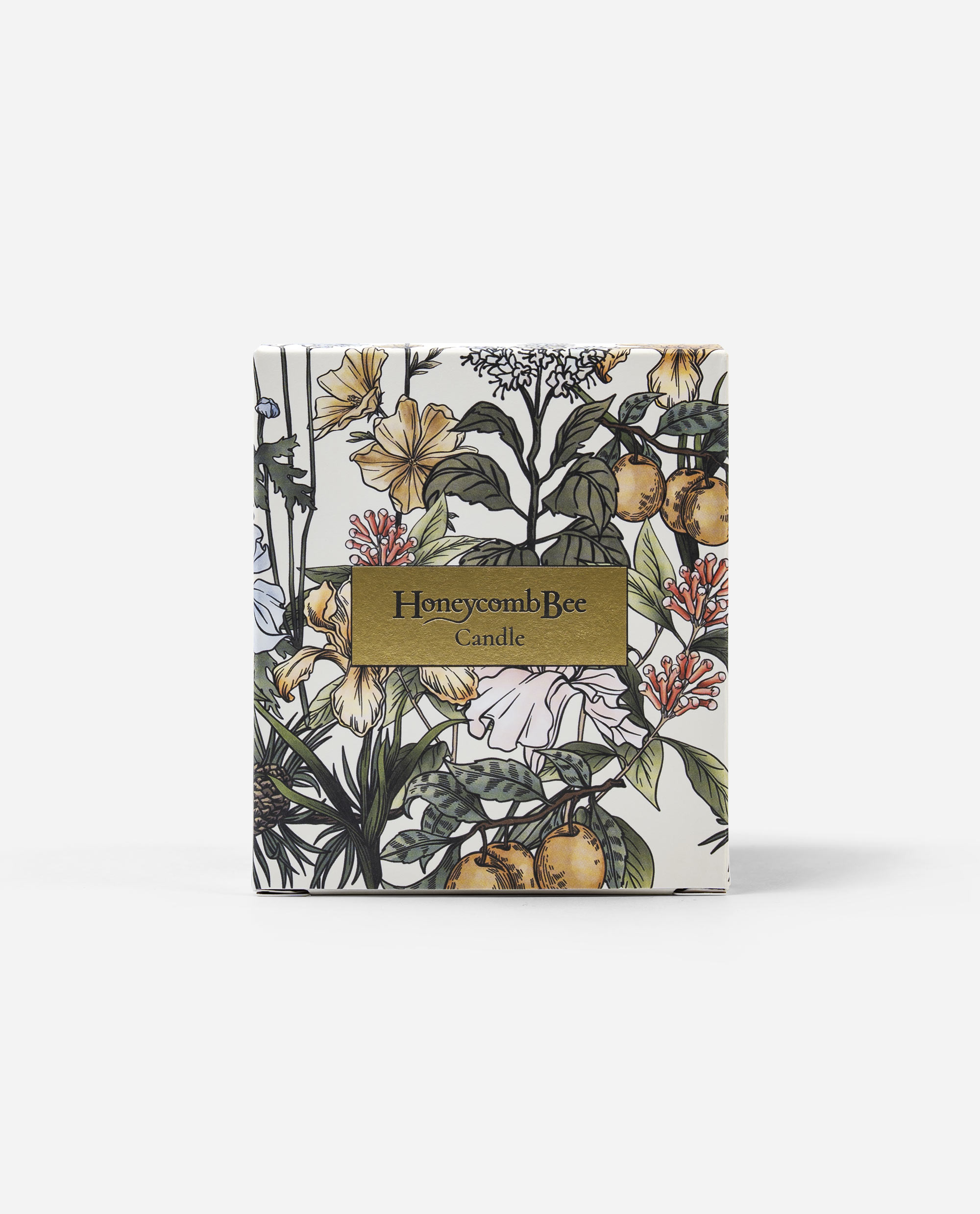 Honeycomb Bee Candle retail packaging showing decorative box with botanical garden illustration in yellows greens and gold label by The Sculpts