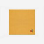 Citrus Vulgaris botanical cotton napkin in ochre yellow with orange and green leaf motif in corner by The Sculpts