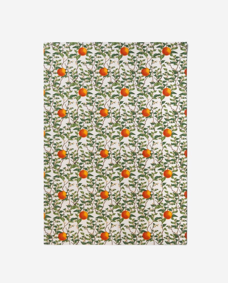 Citrus Vulgaris botanical tea towel flat lay showing repeating orange fruit with green foliage pattern on white cotton background