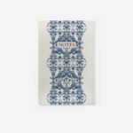 Flight of Feathers notebook front cover with blue ornate feather motif and 'NOTES' label on cream background